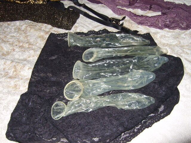 Free porn pics of Condoms - used after four guys fucked my wife 6 of 6 pics