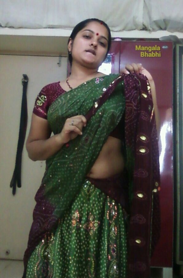 Indian Mangala aunty is ready to undress in front of you 8 of 49 pics