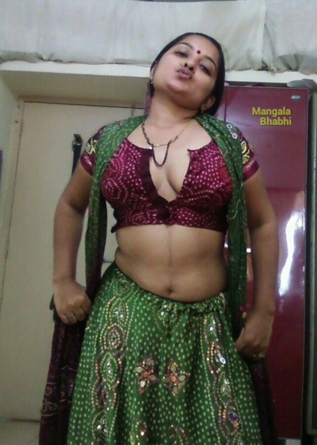 Indian Mangala aunty is ready to undress in front of you 20 of 49 pics