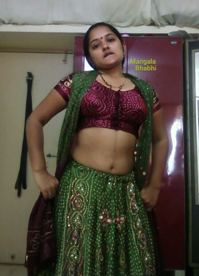 Indian Mangala aunty is ready to undress in front of you 16 of 49 pics