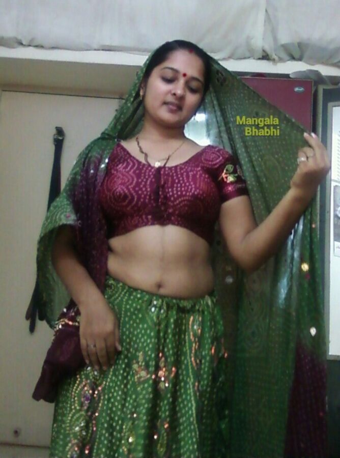 Indian Mangala aunty is ready to undress in front of you 11 of 49 pics