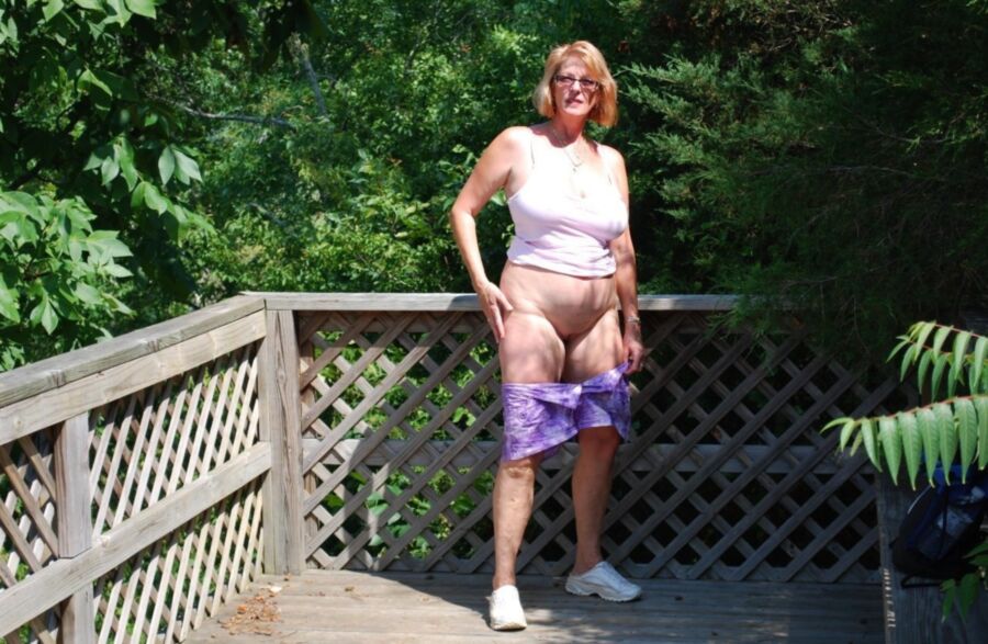 Chubby Mature with Big Tits Poses Outside 3 of 10 pics