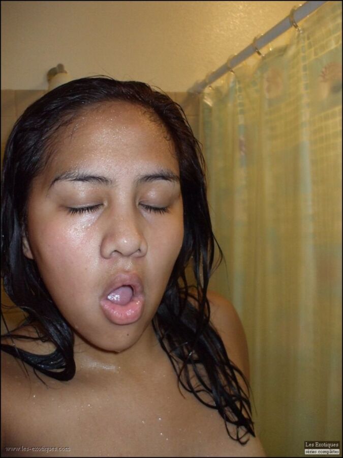 Cute chubby Asian shows her fuckface 5 of 7 pics