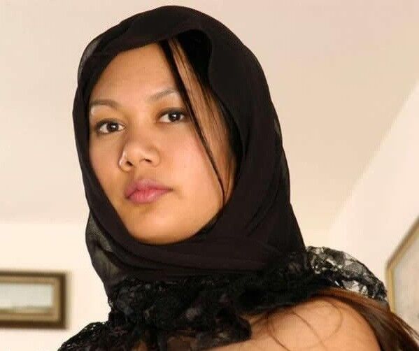 Malay woman wearing black hijab 1 of 5 pics