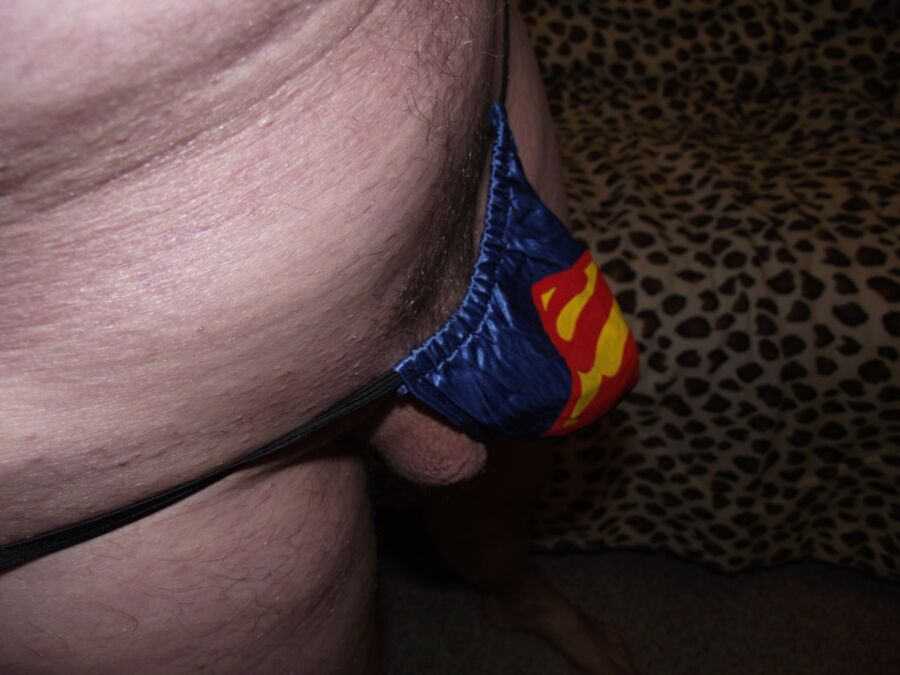 in and out of My Superman G-string 5 of 10 pics
