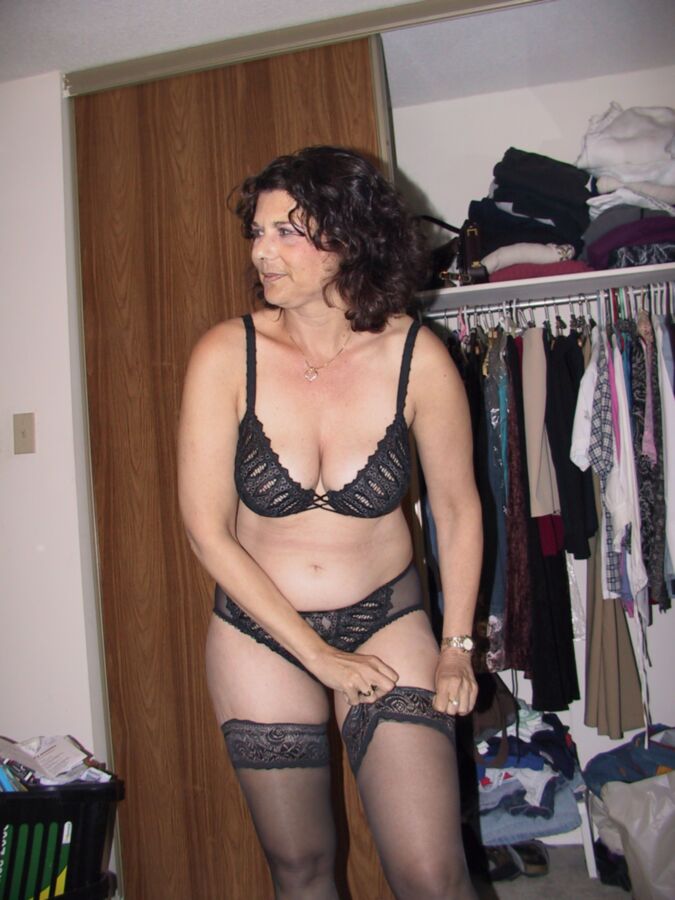 Free porn pics of Lusy black lingerie slut 5 of 14 pics