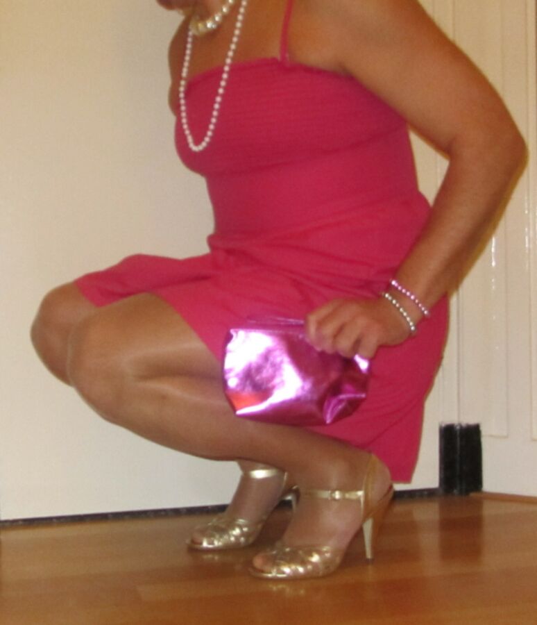 Me Cindy Cross crossdressing in a pink summer dress 3 of 7 pics
