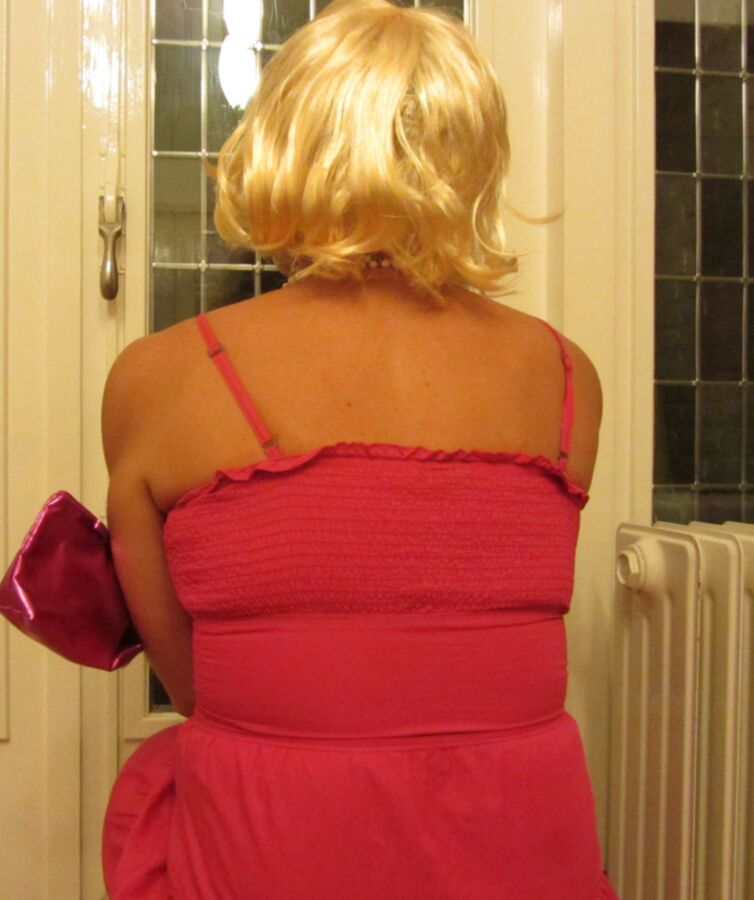 Me Cindy Cross crossdressing in a pink summer dress 2 of 7 pics