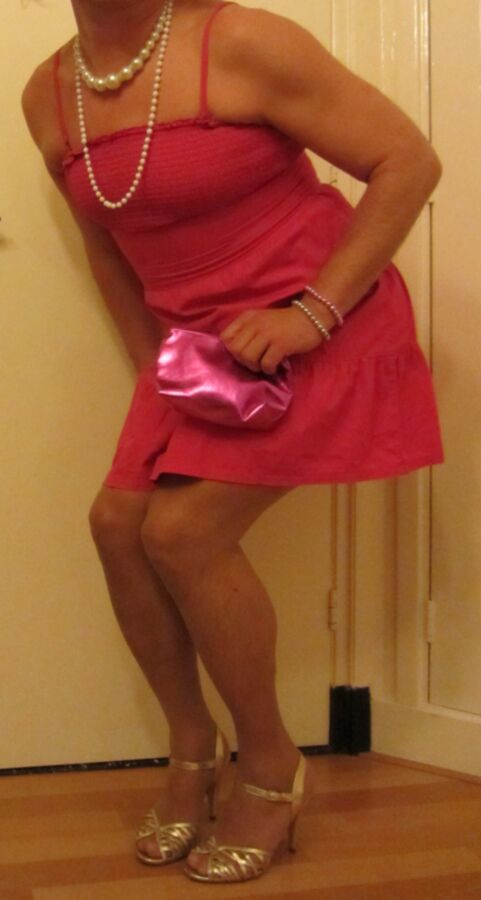 Me Cindy Cross crossdressing in a pink summer dress 1 of 7 pics