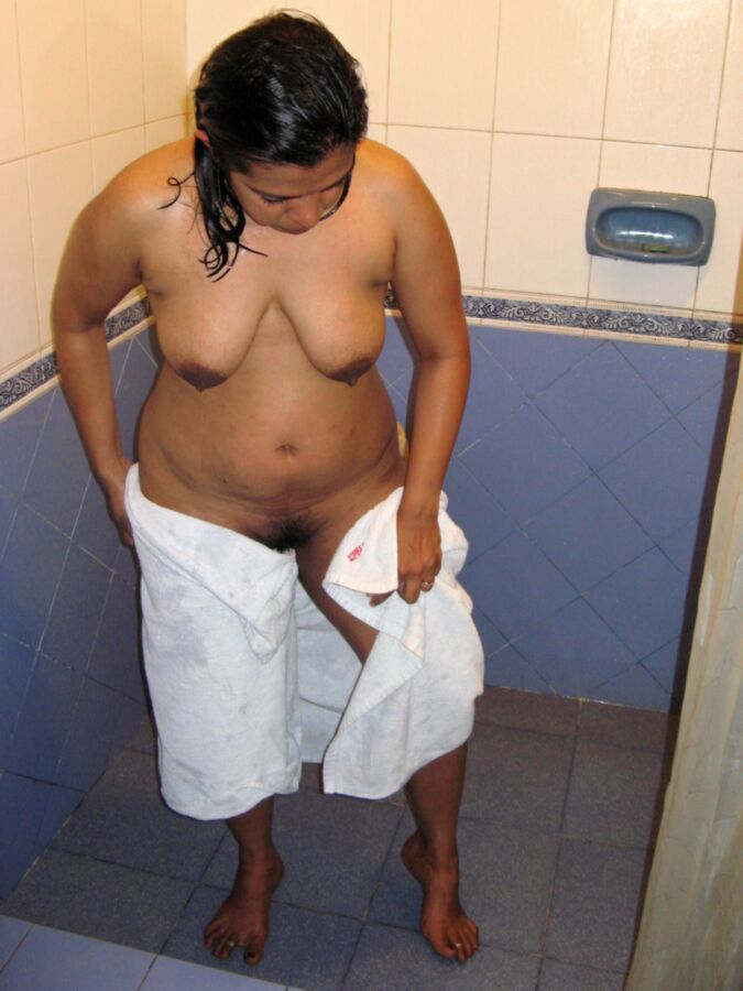 Amateur Indian wife showering her chubby body 1 of 8 pics