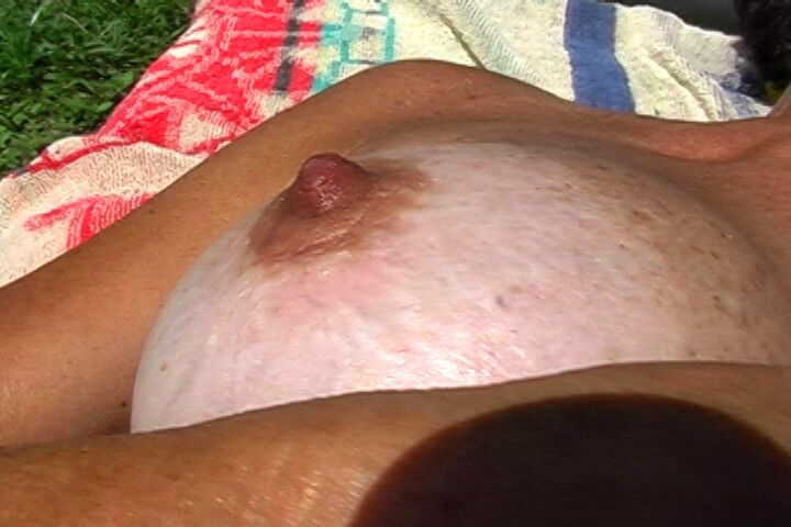 Free porn pics of My nice tits and hard nipples sunbathing 17 of 31 pics