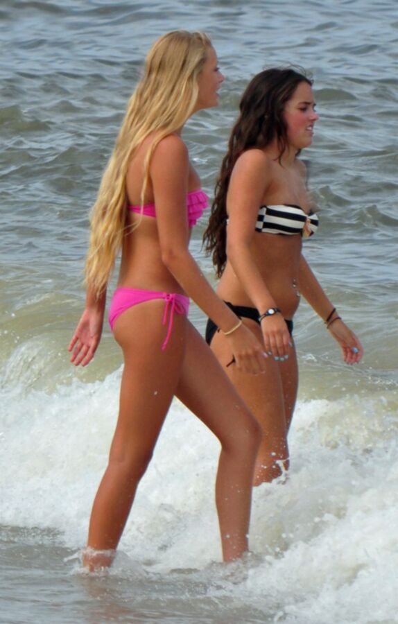 Free porn pics of Long-haired teen blonde and brunette - sexy pair at the sea 1 of 12 pics