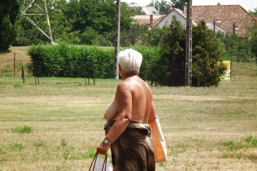 Free porn pics of Granny topless in garden 11 of 13 pics