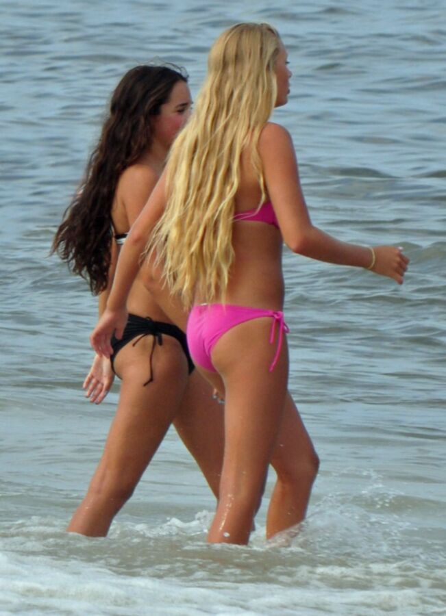 Free porn pics of Long-haired teen blonde and brunette - sexy pair at the sea 7 of 12 pics
