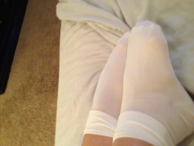 Free porn pics of MILF gagged and wearing white socks 11 of 17 pics