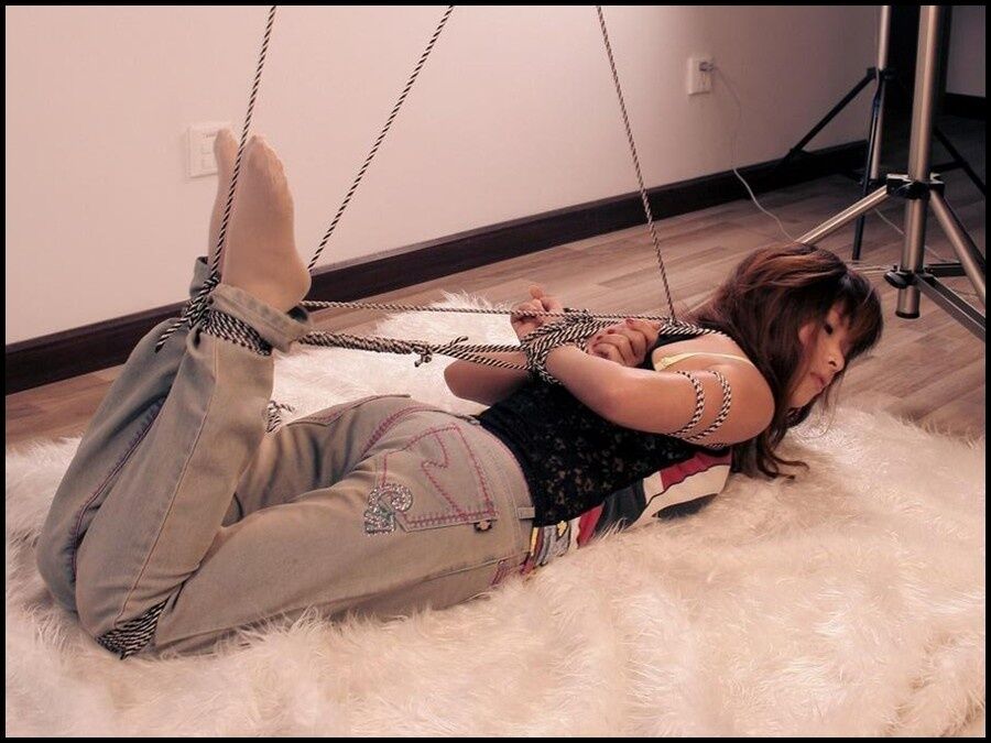 Chinese hogtied girl in jeans 7 of 16 pics