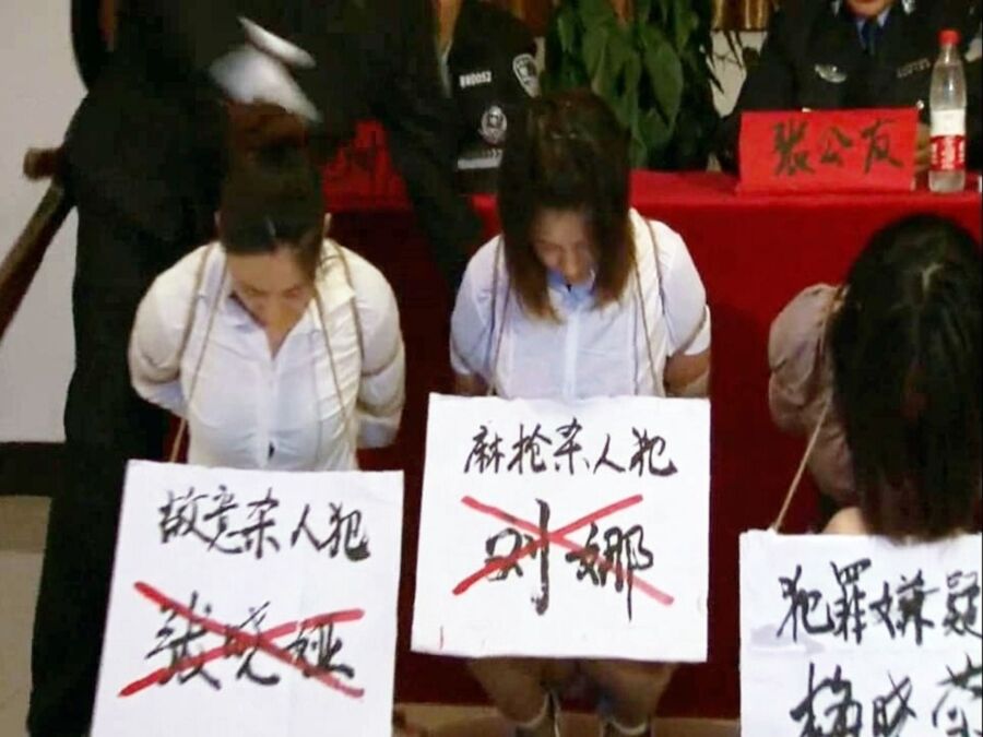 Chinese prisoner placard humiliation 10 of 40 pics