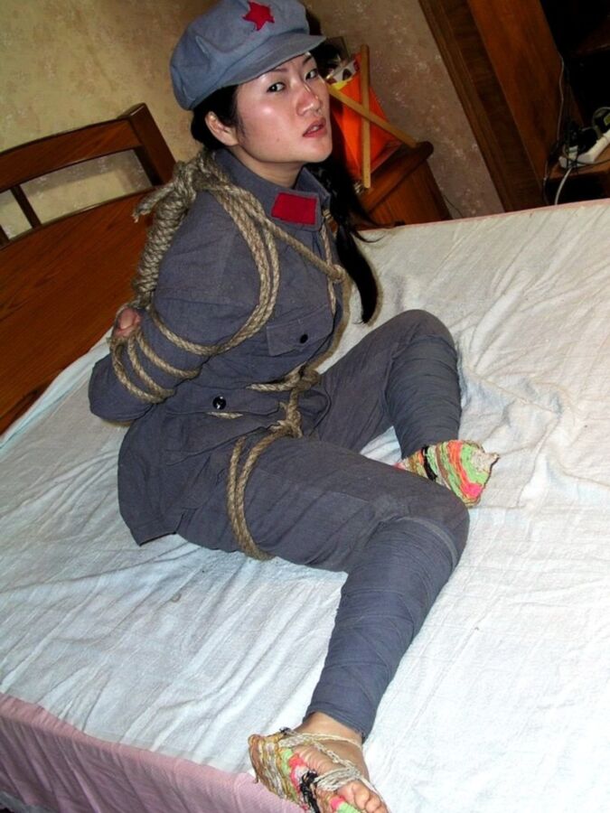 Chinese soldier girl tied up with heavy rope 3 of 12 pics