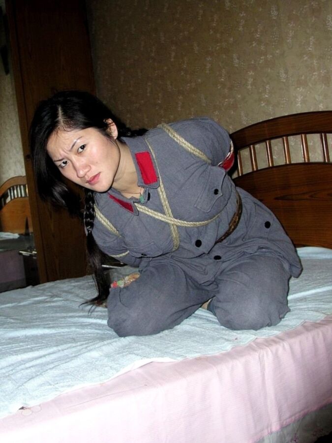 Chinese soldier girl tied up with heavy rope 2 of 12 pics
